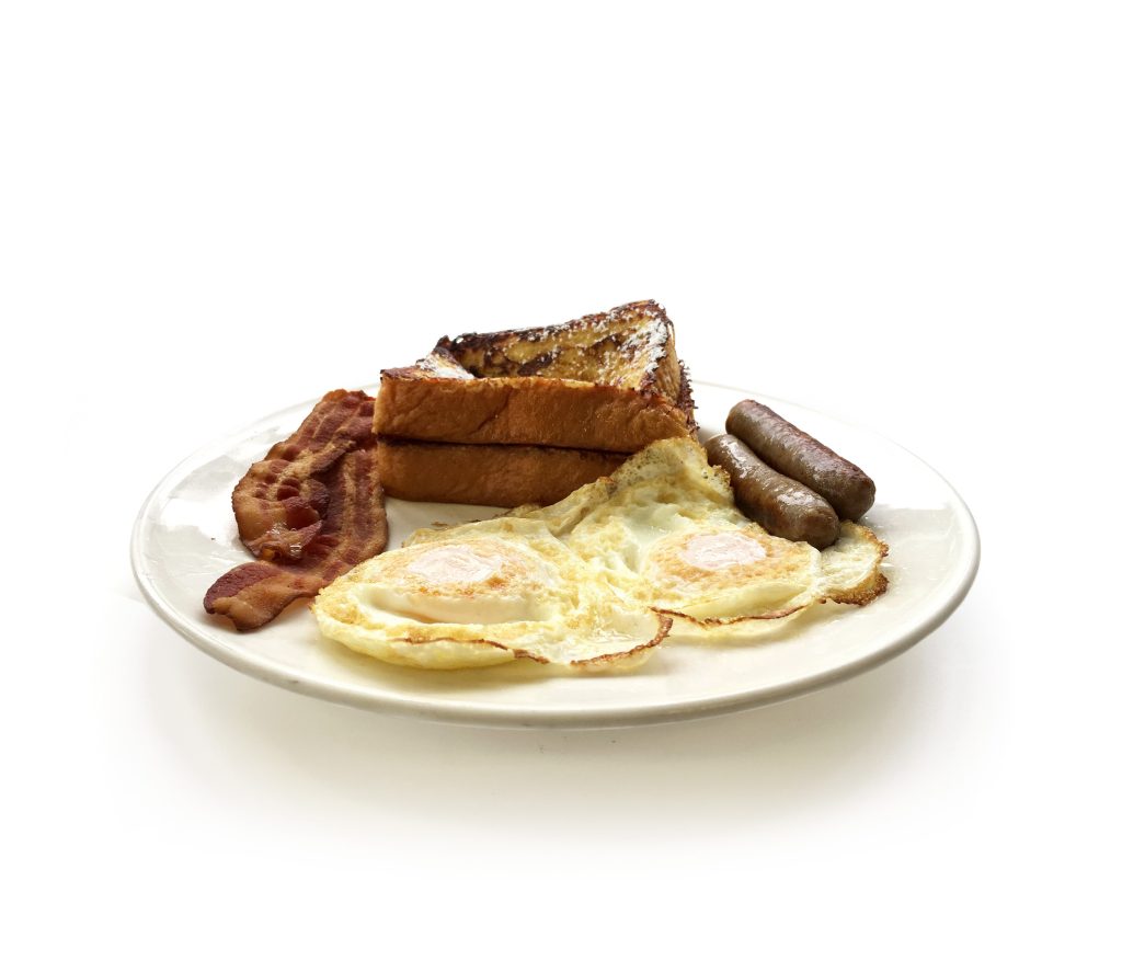 4 Deuces breakfast special with eggs, pancakes, bacon, and sausage at Northside Grill